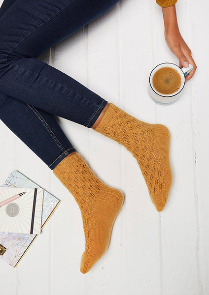 Firre Socks lace knitting pattern by Joanna Ignatius