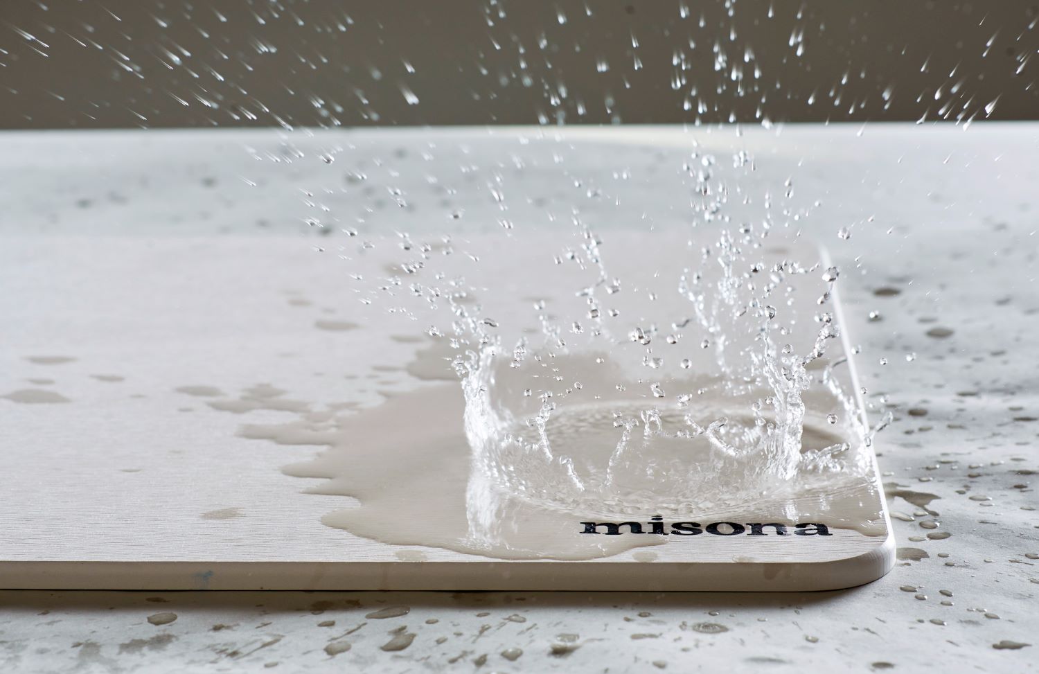 Water Splashing on a Diatomite Bath Mat