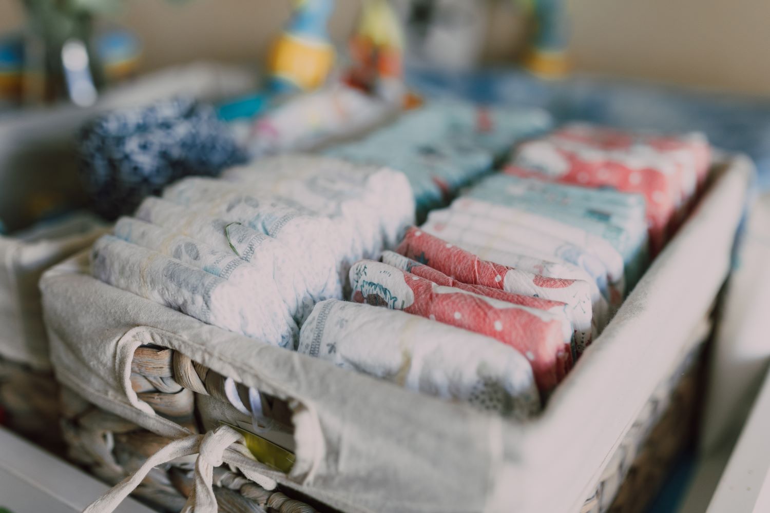 Organized Diapers in a Woven Basket