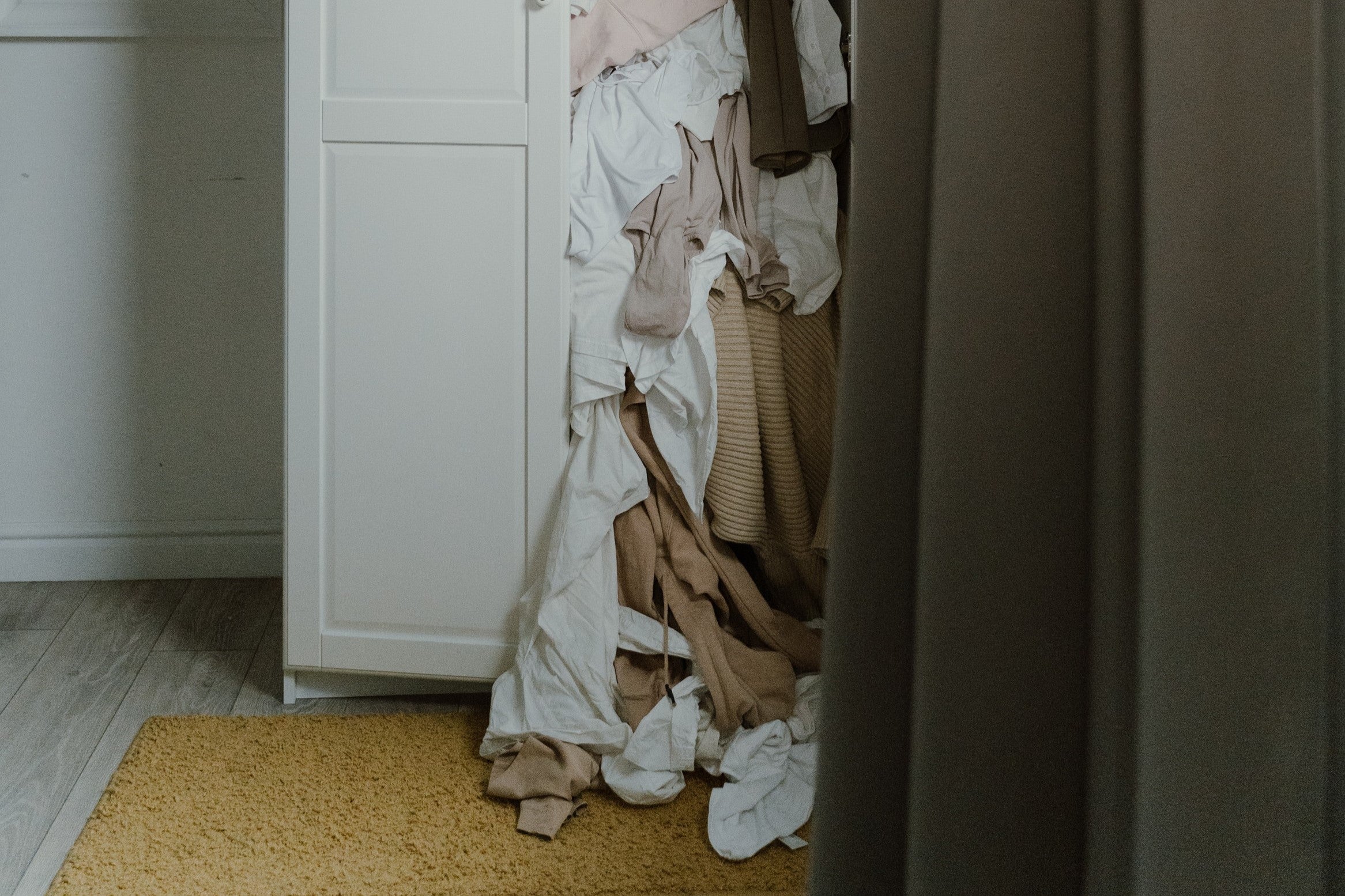 Untidy and Messy White Wardrobe