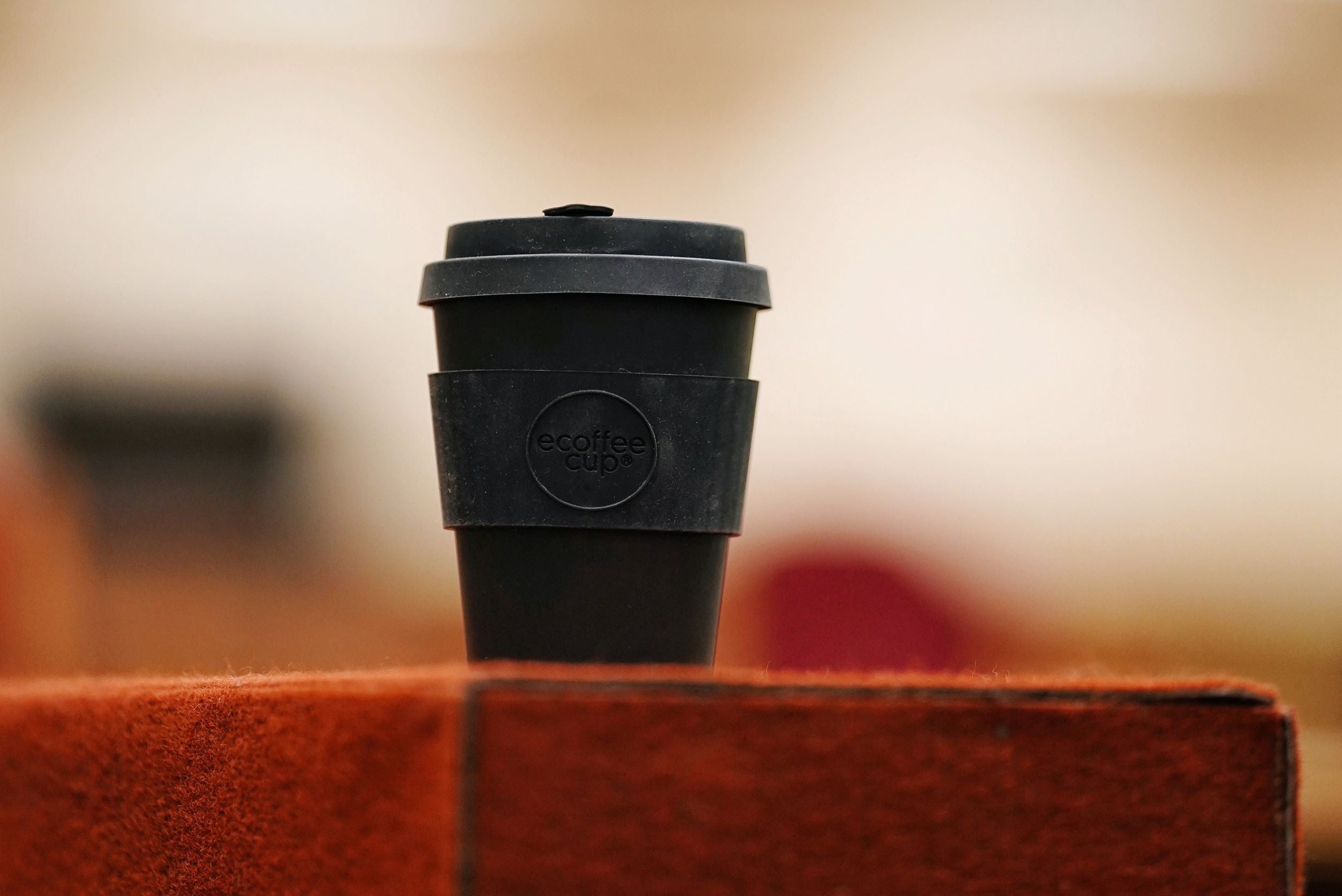 Reusable Coffee Cup on Blur Background