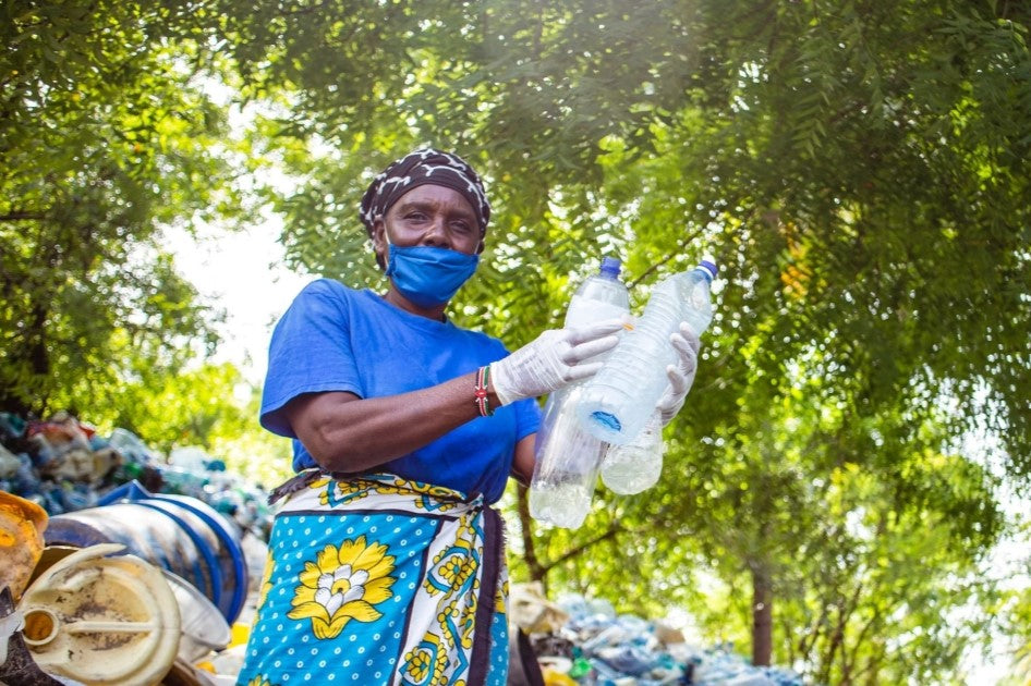 Woman Sorting Plastic