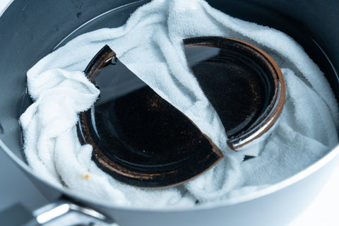 Boiling a vessel to remove superglue