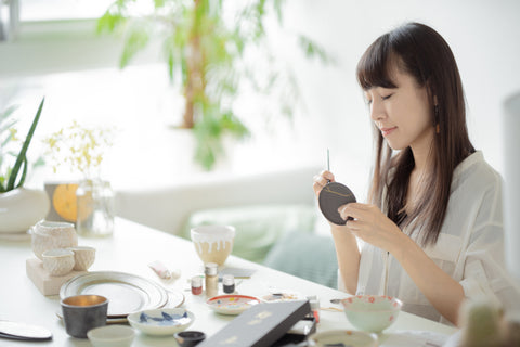 Matano-san doing traditional kintsugi