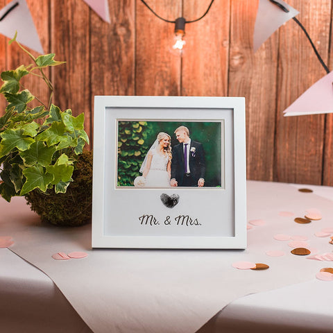 Photo frame with thumb print.