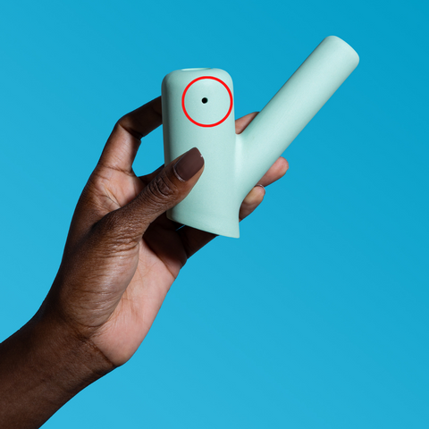 woman showing carb on jaunt branch ceramic pipe