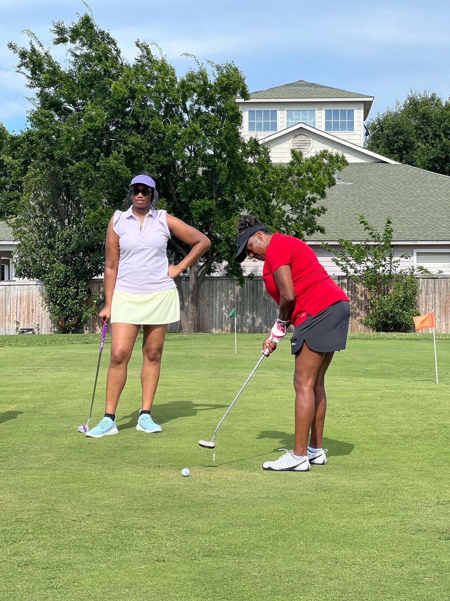 Fairmonde golf clinic | two black american ladies | playing golf