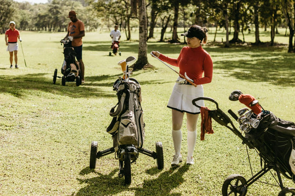 women on the golf course | Golf Carts