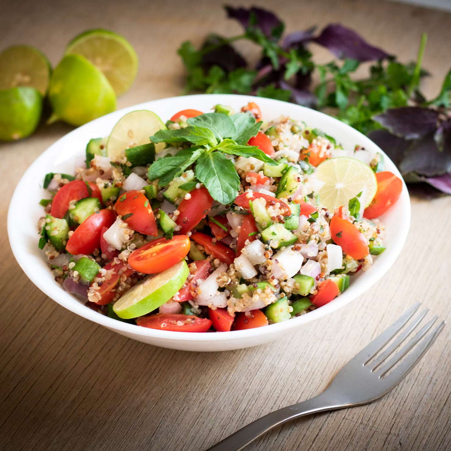 Quinoa salad bowl | vegetables | fork