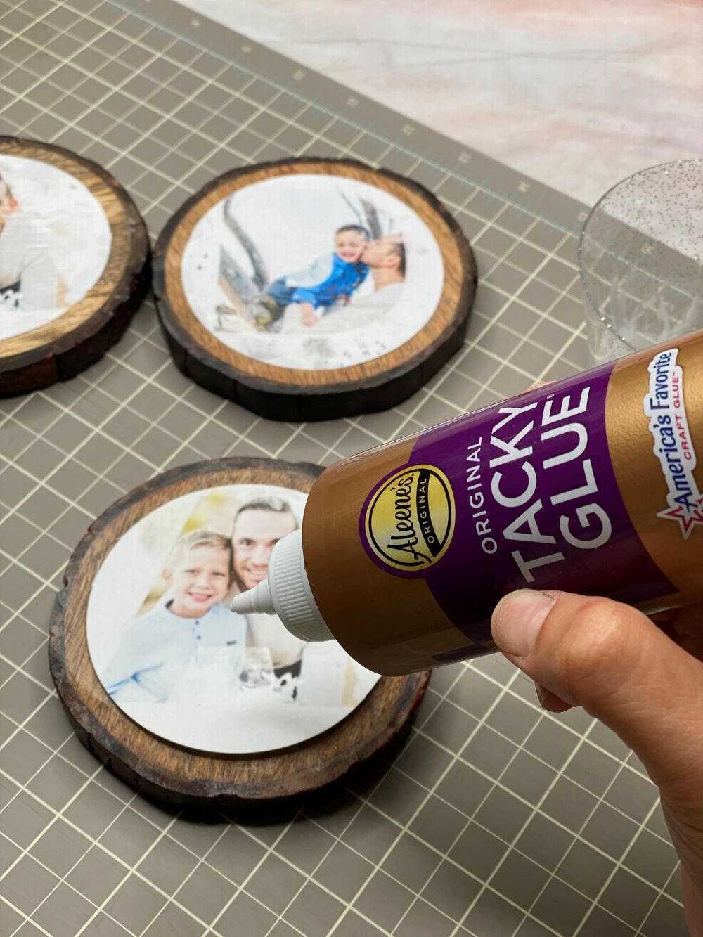 Glue each photo onto a coaster