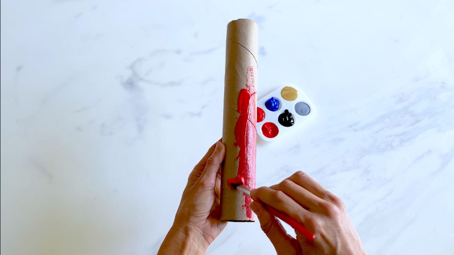 Paint one of the paper towel tubes