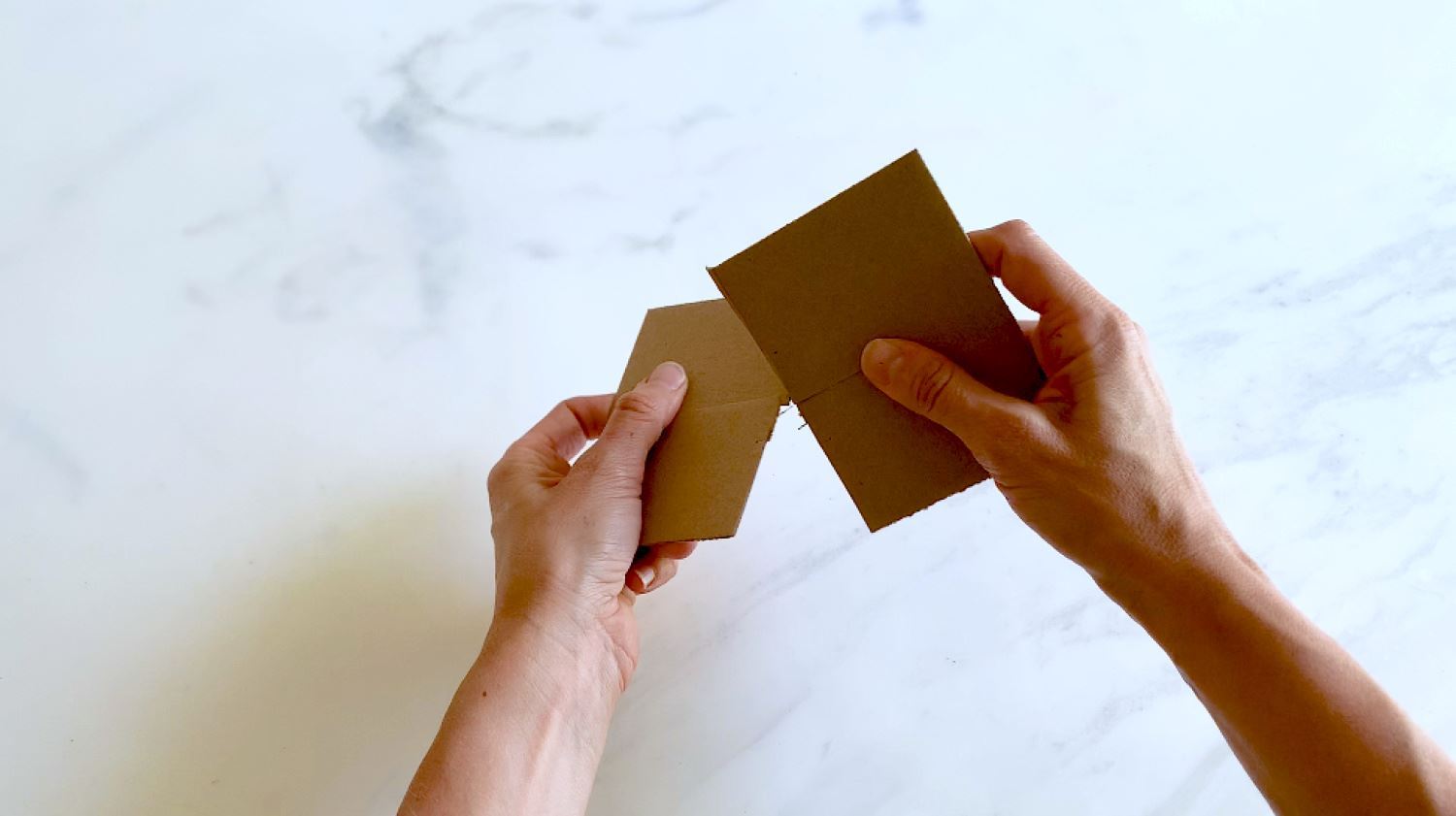 Cut and merge cardboard squares for base