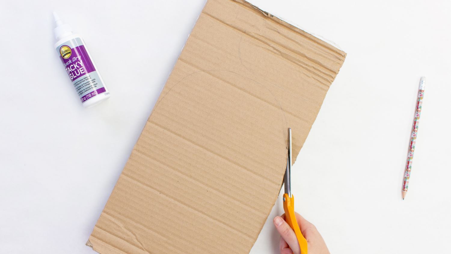 Draw and cut out a U shape from cardboard