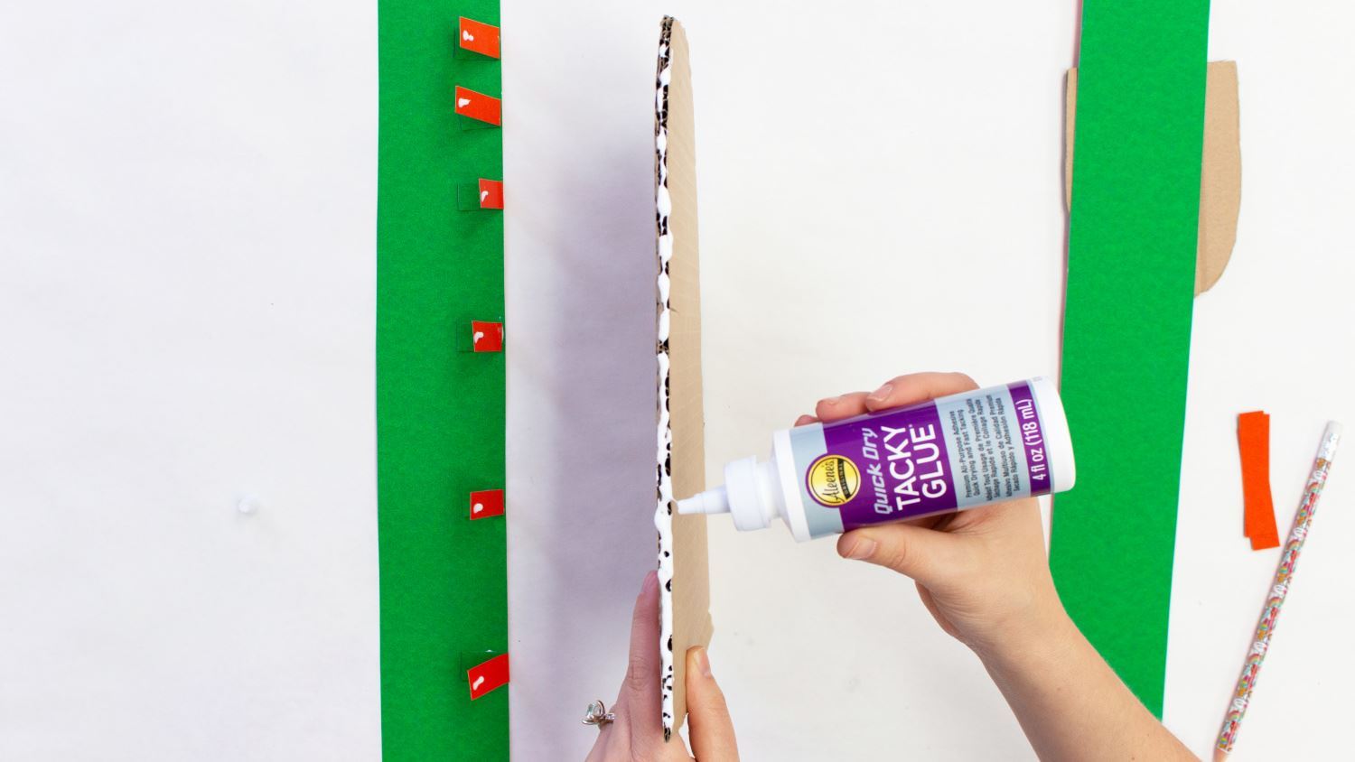 Add glue around cardboard