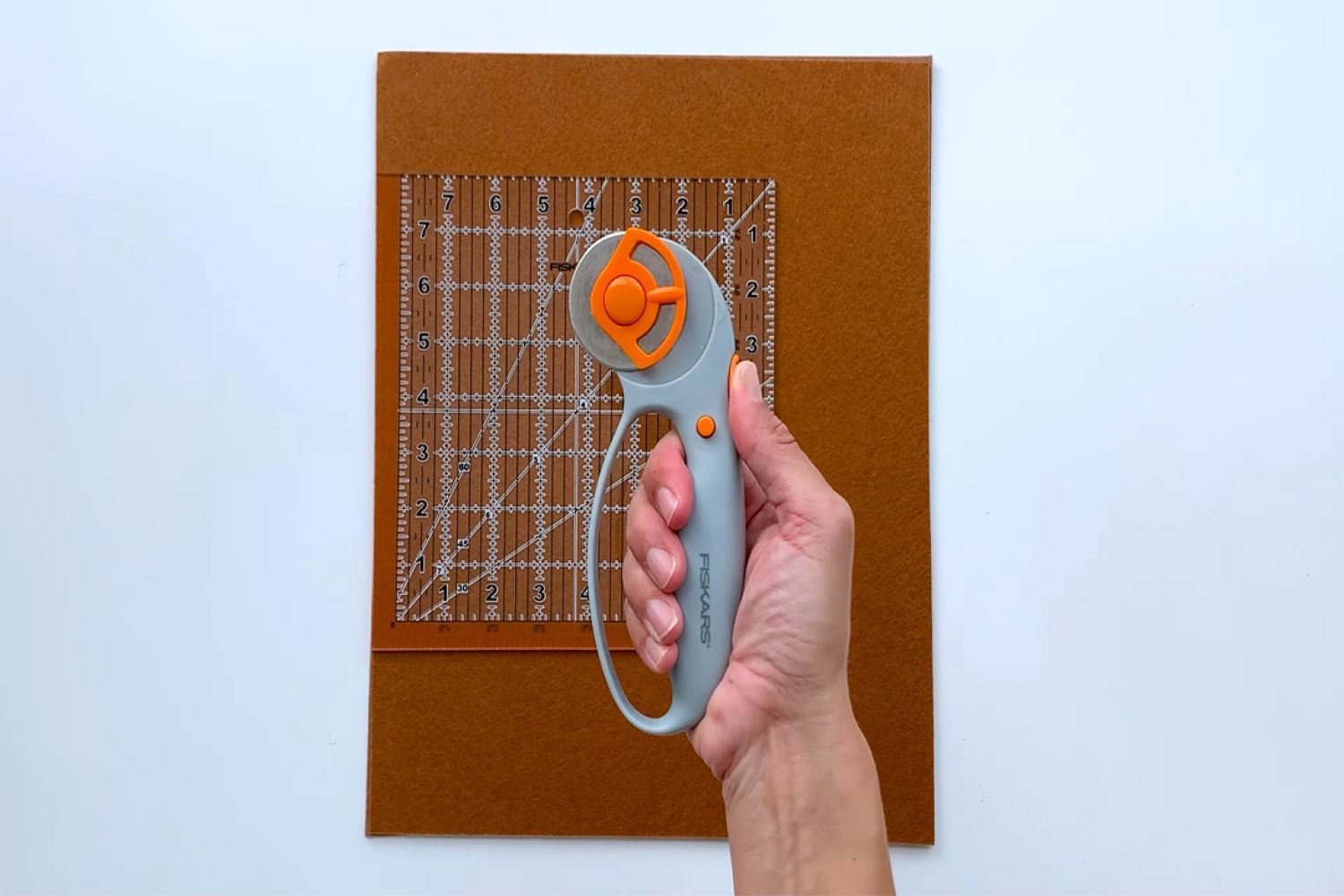 Measure and cut felt with scissors or a loop rotary cutter
