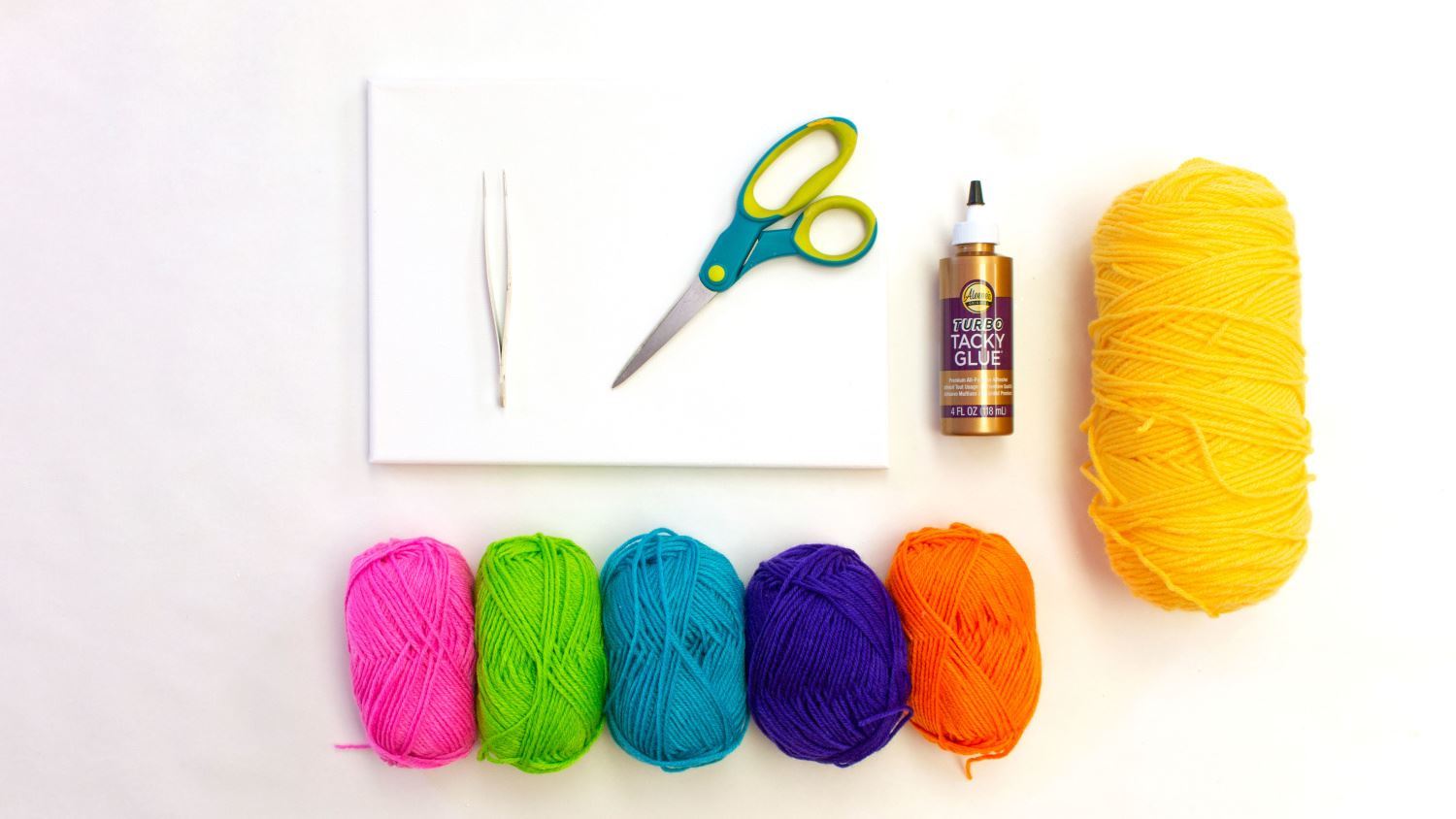 Gather supplies for DIY yarn art