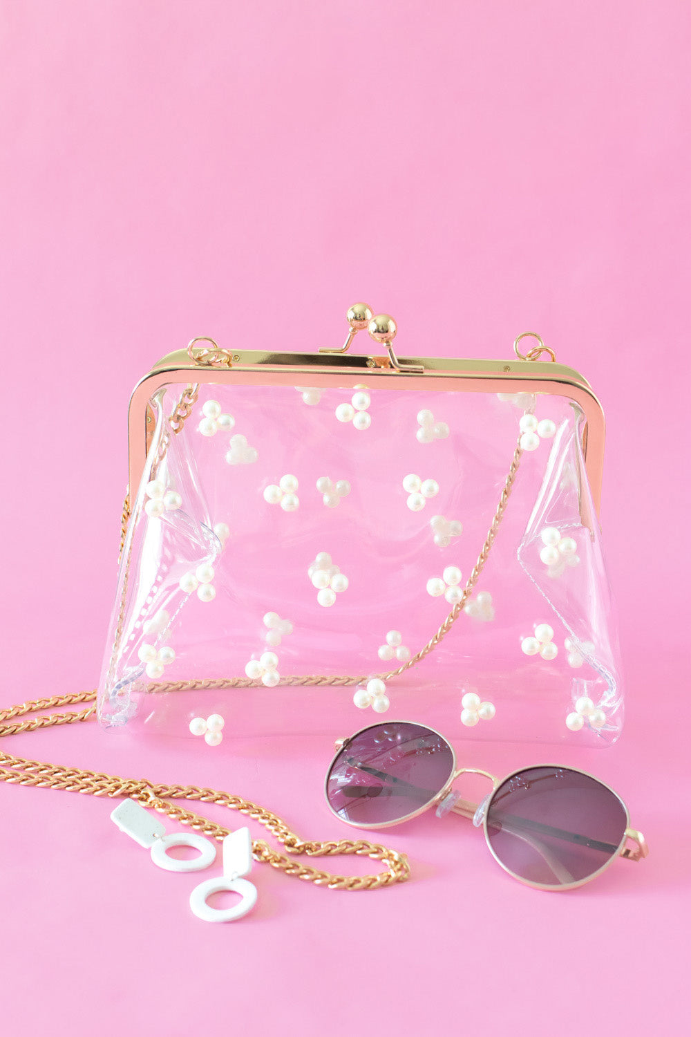 Transparent purse with pearl cluster embellishments