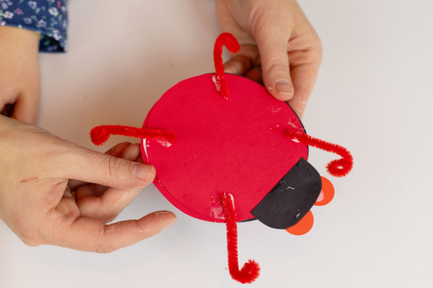 Assemble the paper ladybug with Tacky Glue