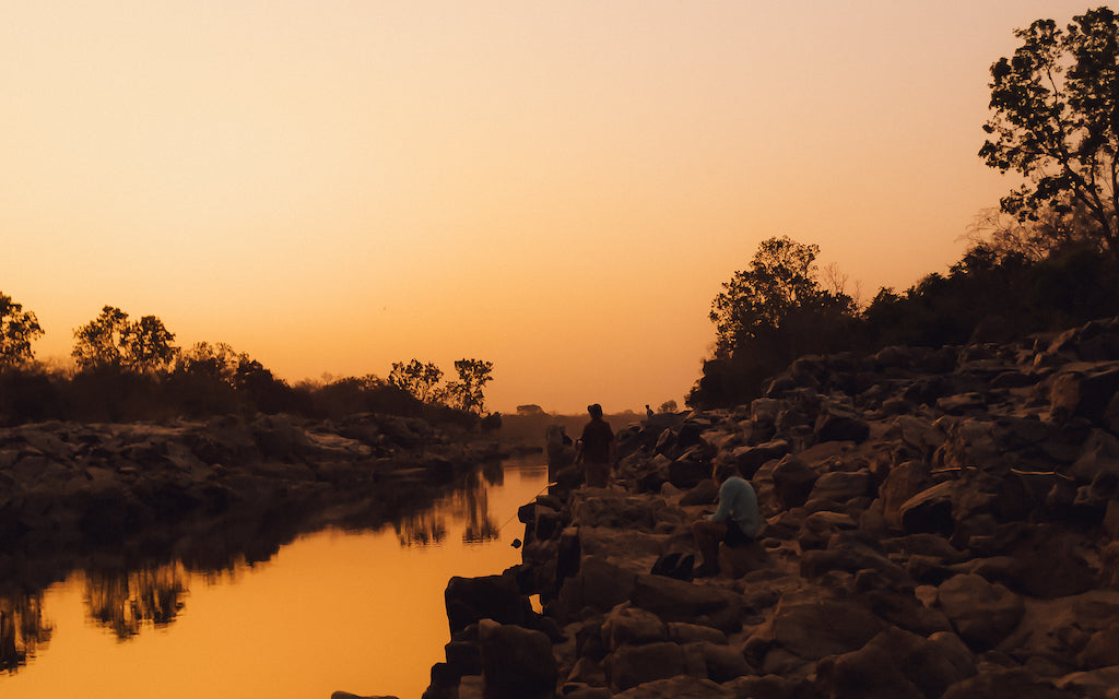 sun setting in Africa - Fera Outfitters