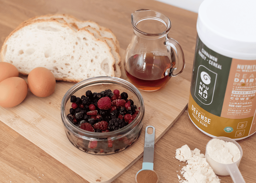 Ingredients for making our french toast, bread, eggs, Pounamu Protein Immunity Blend. With a jug of maple syrup and frozen berries for on top.