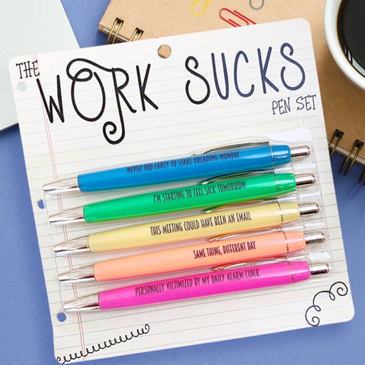 https://cdn.shopify.com/s/files/1/0574/0888/0830/products/work-sucks-pen-set_512x512.jpg?v=1700108462