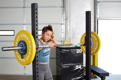 Woman setting up for squats