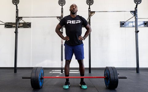 Lifter standing by the Colorado Bar