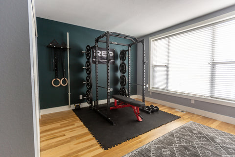 A home gym with gym flooring