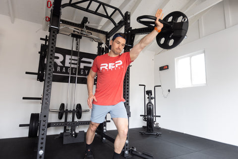 Man working out on power rack