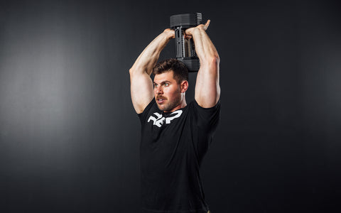Man using the best adjustable dumbbell