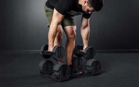 Man using the best adjustable dumbbell