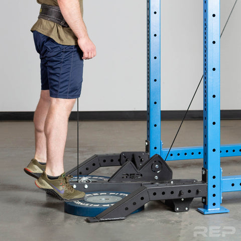 Calf raises on a dip belt