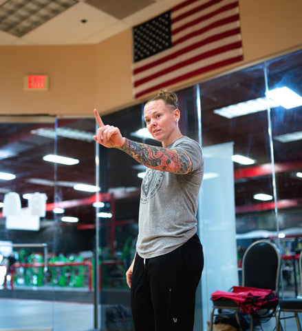 Bama Burr, powerlifter, speaking at an event