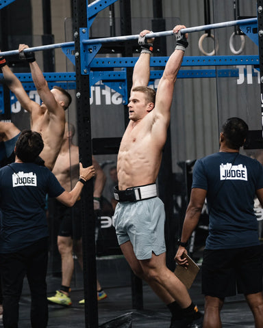 Dallin Pepper doing muscle-ups at a CrossFit game