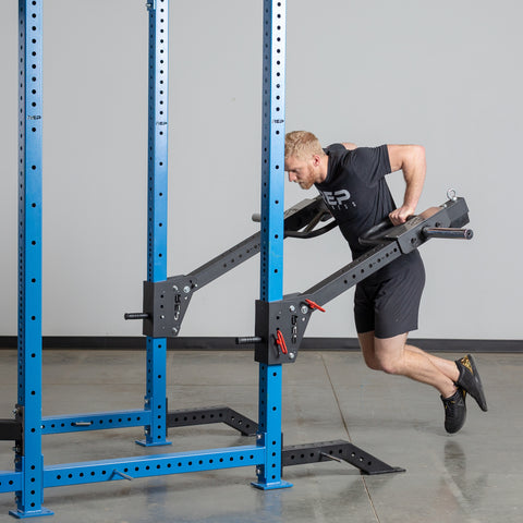 Man doing dips on dip handles