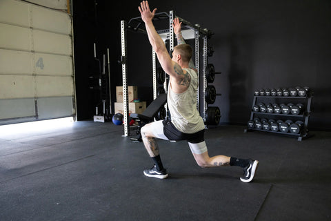 Lifter doing mobility drills