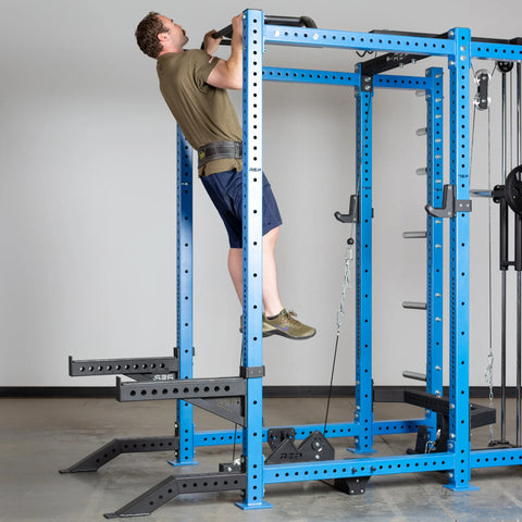 Man doing weighted pull-ups