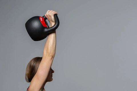 Woman working out with a kettlebell