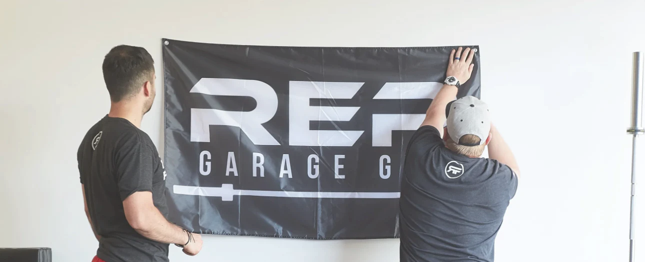 REP Garage Gym Flag Being Hung Up
