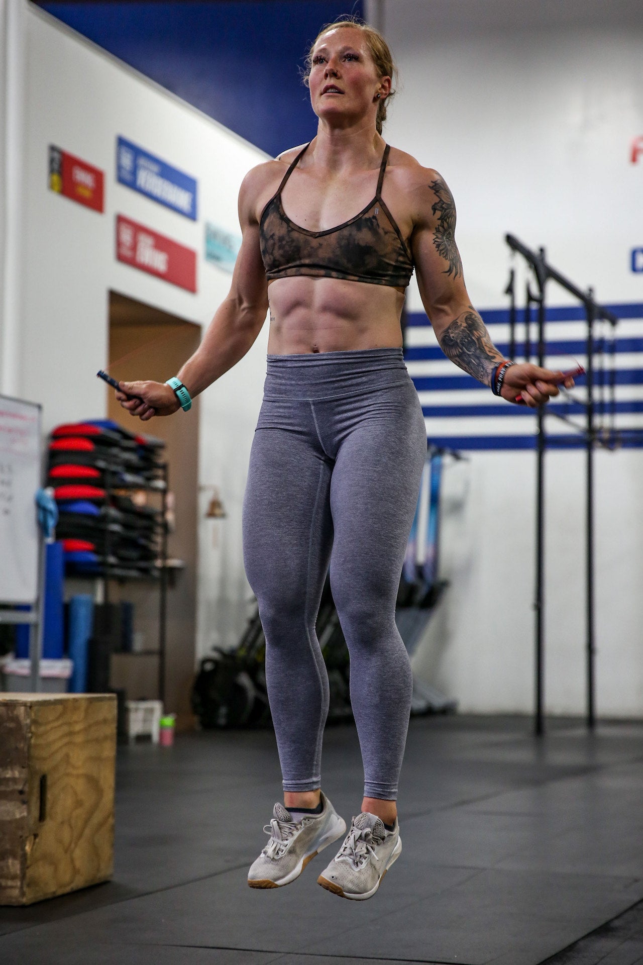 Lifter jumping rope in a gym