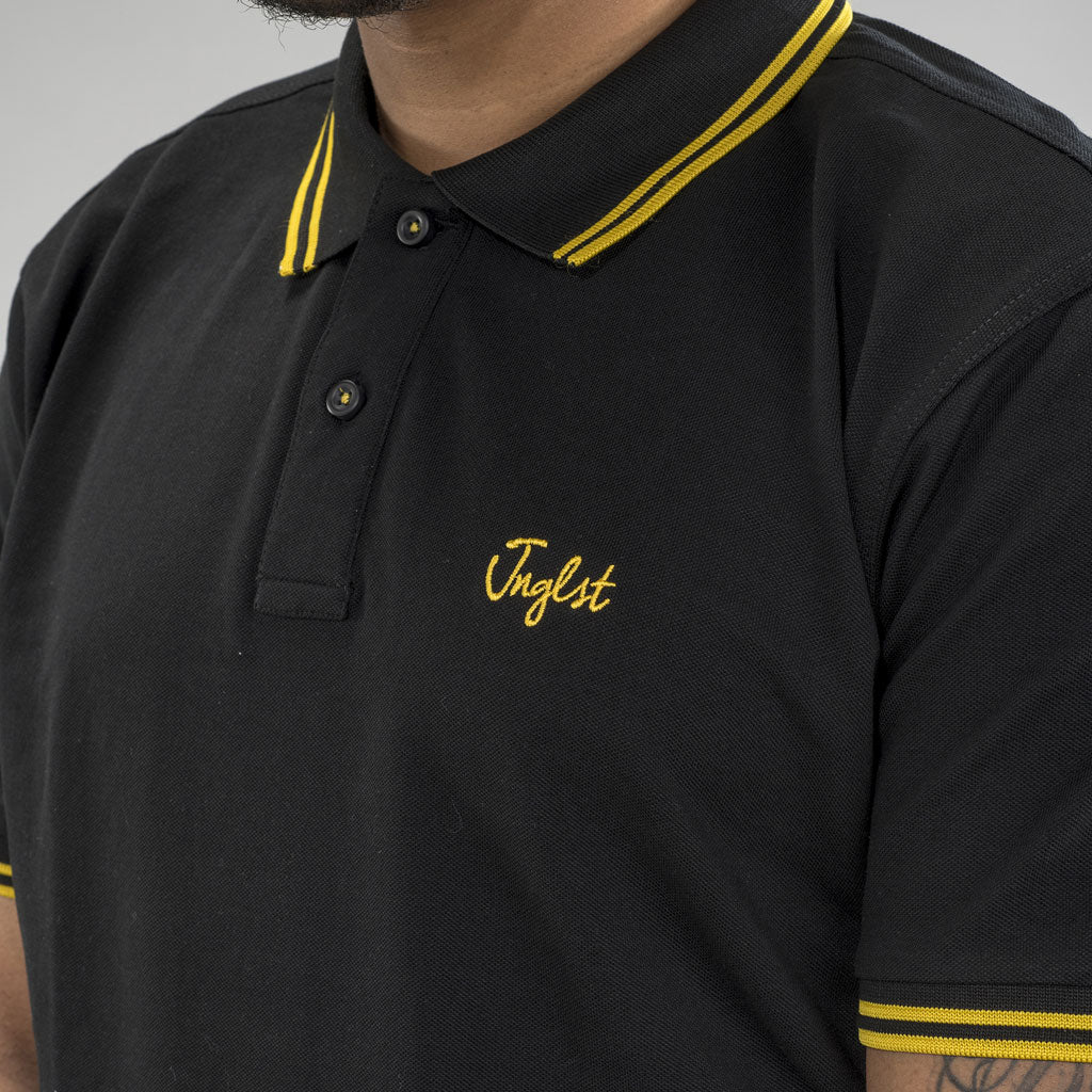 black and yellow polo shirt