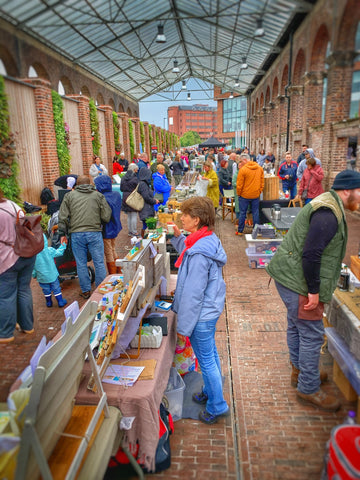 Stall holders greeting customers at Chester Makers Market
