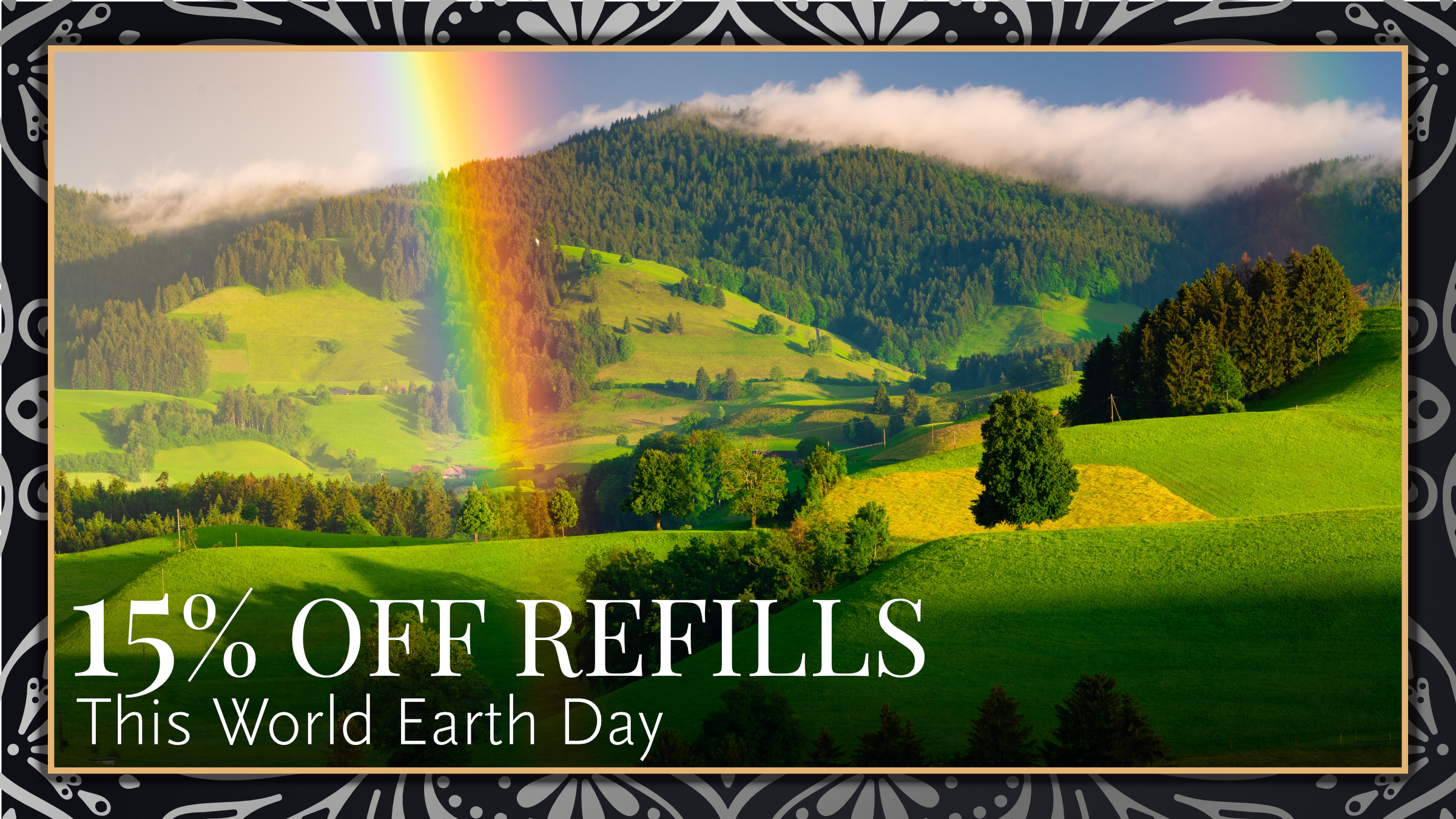 15% off refills for World Earth Day - a photo of a green countryside with a rainbow streaking across