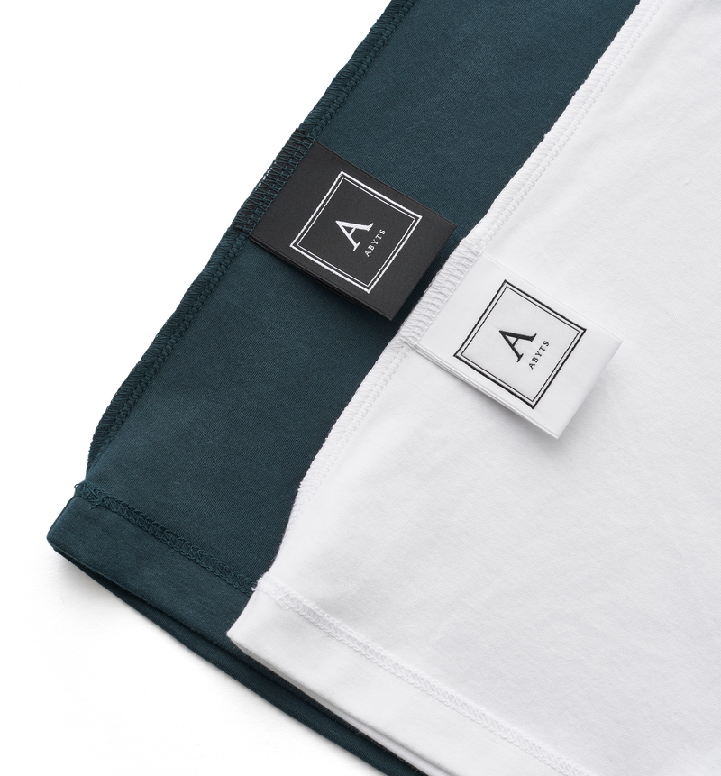 佐藤健 ABYTS NECK MINI LOGO T-SHIRT NAVY Tシャツ | app