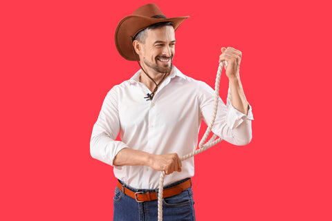 man dressed in cowboy costume