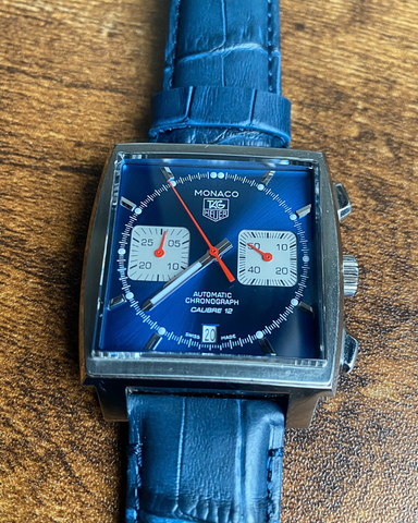 TAG Heuer Monaco Calibre 12 in stainless steel featuring a blue b