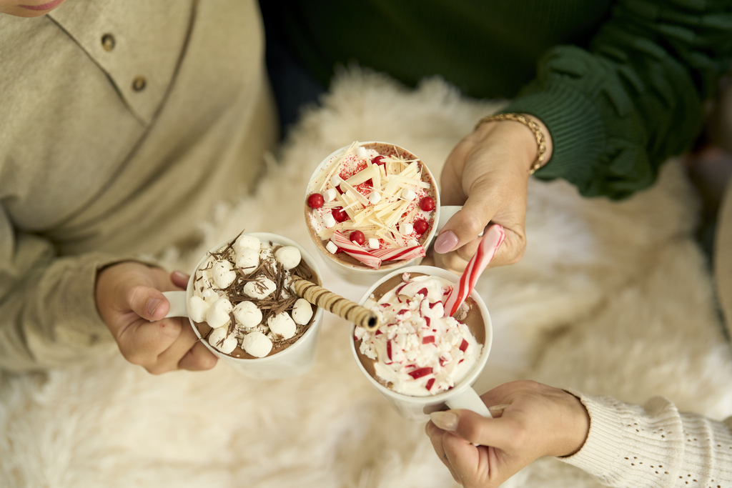 friends enjoying hot chocolate