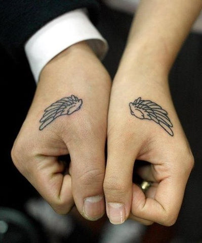 Tatouage Plume couple