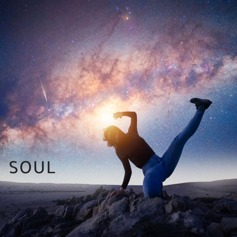 A woman dancing to the stars as she expresses her soul, a powerful and meaningful word in the spiritual world.