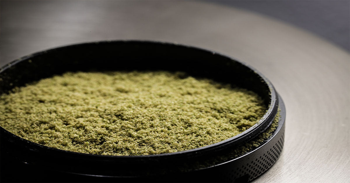 Cannabis kief in black jar